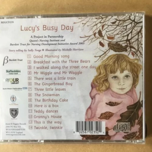 Lucy's Busy Day (A Journey Through The Day In Story, Song & Rhyme) Sally Tonge