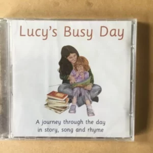 Lucy's Busy Day (A Journey Through The Day In Story, Song & Rhyme)