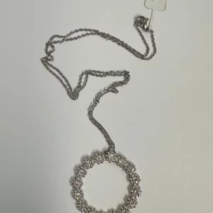 Necklace With a Circular Pendant Made of Crystals and a Silver Chain.